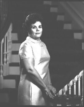 Judy Agnew on staircase in Government House