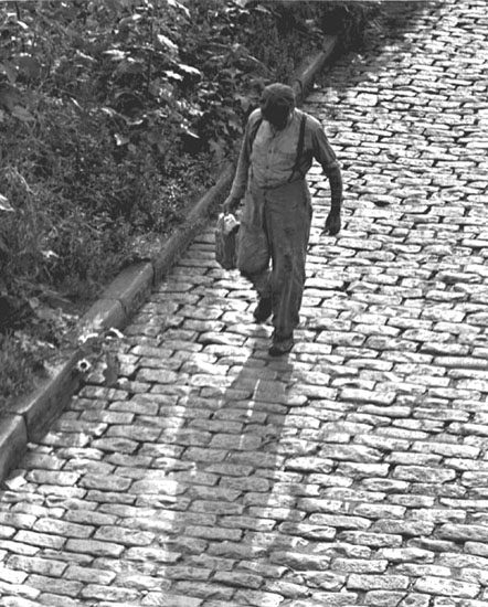 Walking on cobblestones, St. Louis, 1942