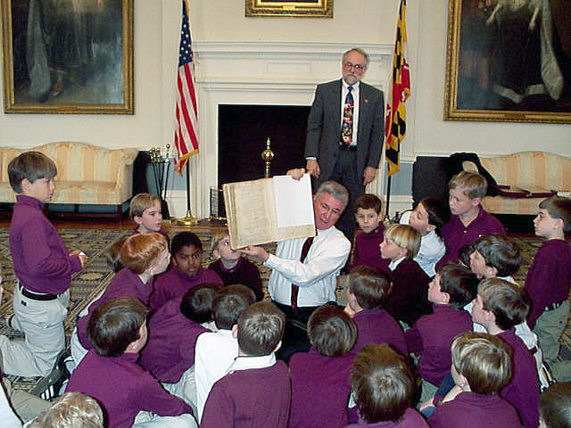 [Governor Glendening shows Act of Toleration to students]