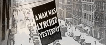 Image of a Flag that says a man was lynched yesterday