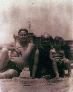 Mathias at age 3 with parents in Ocean City, Maryland