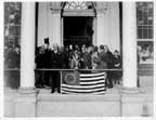 Click here for larger image of the Governor on the State House steps