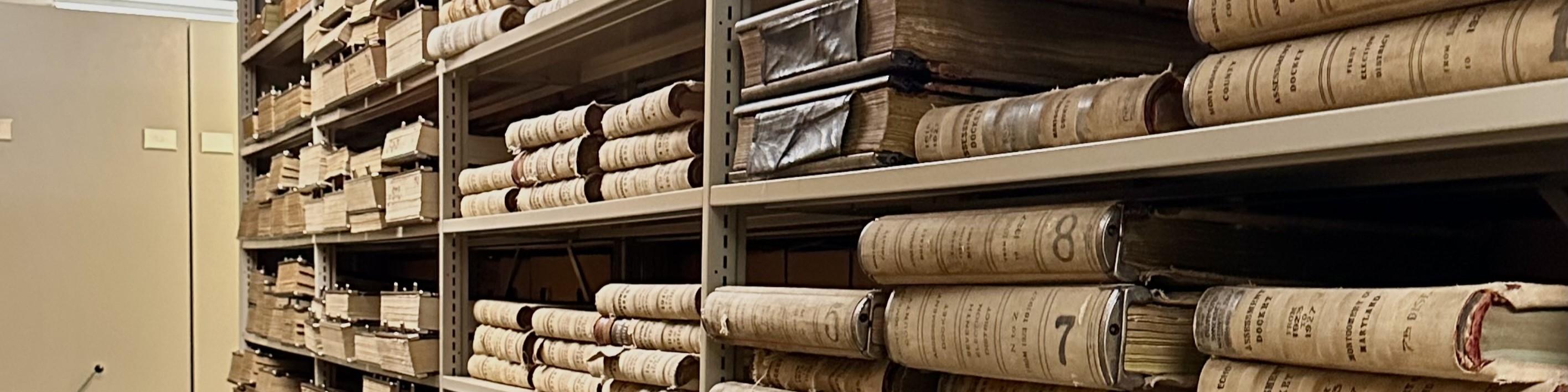 Image of row of stacks in the State Archives.