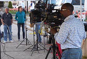 [photo, TV news film crew, City Hall Plaza, Baltimore, Maryland]