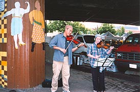 [photo, Street musicians near Baltimore Farmers' Market, Holliday St., Baltimore, Maryland]