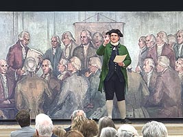 [photo, Historical interpreter as Aquila Hall reading Bush River Declaration, Bel Air Armory, Bel Air, Maryland]