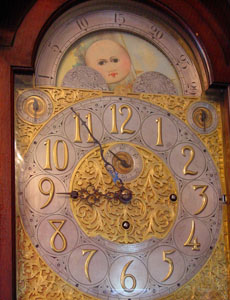 Face for tall case clock by Hennegan Bates & Company