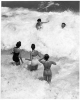 Three women playing in the surf, Ocean City