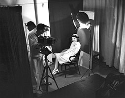 Marion Warren and Mary Giblin in the portrait studio at Main Navy Building, Washington, DC, 1943