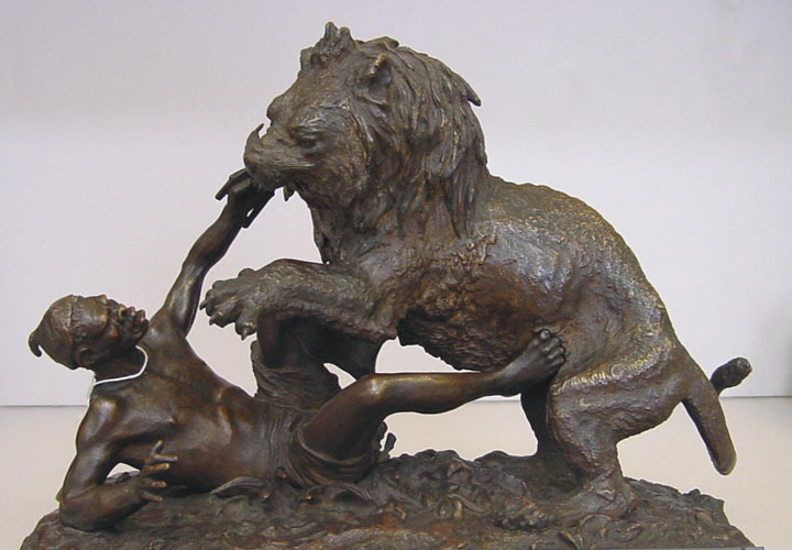 Sculpture - Lion Attacking an African Native